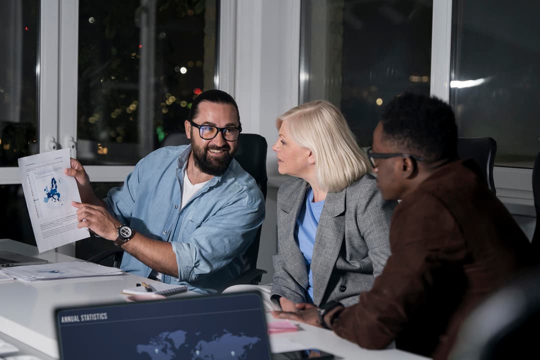 Teammates working late